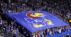 KU giant fan flag in crowd at football game