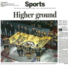Newspaper article showing our custom championship banner for the Boston Bruins