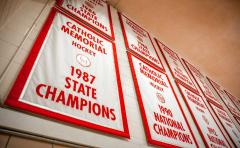 Applique championship banners for Catholic Memorial