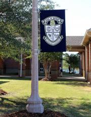 Printed sunbrella lightpole banners for Paul W. Bryant High School