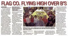 Newspaper article showing our custom championship banner for the Boston Bruins