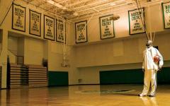 Kevin Garnett with Celtics championship banners at practice facility