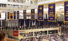 Championship banner set hanging in University of Northern Iowa's stadium