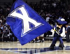 xavier mascot cheer flag basketball